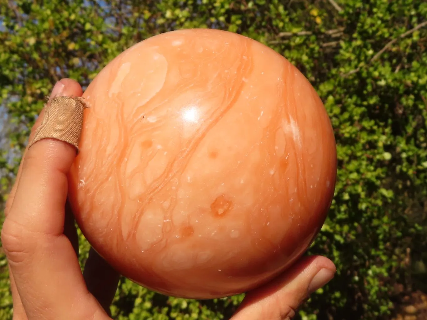 Polished Large Orange Twist Calcite Sphere  x 1 From Maevantanana, Madagascar