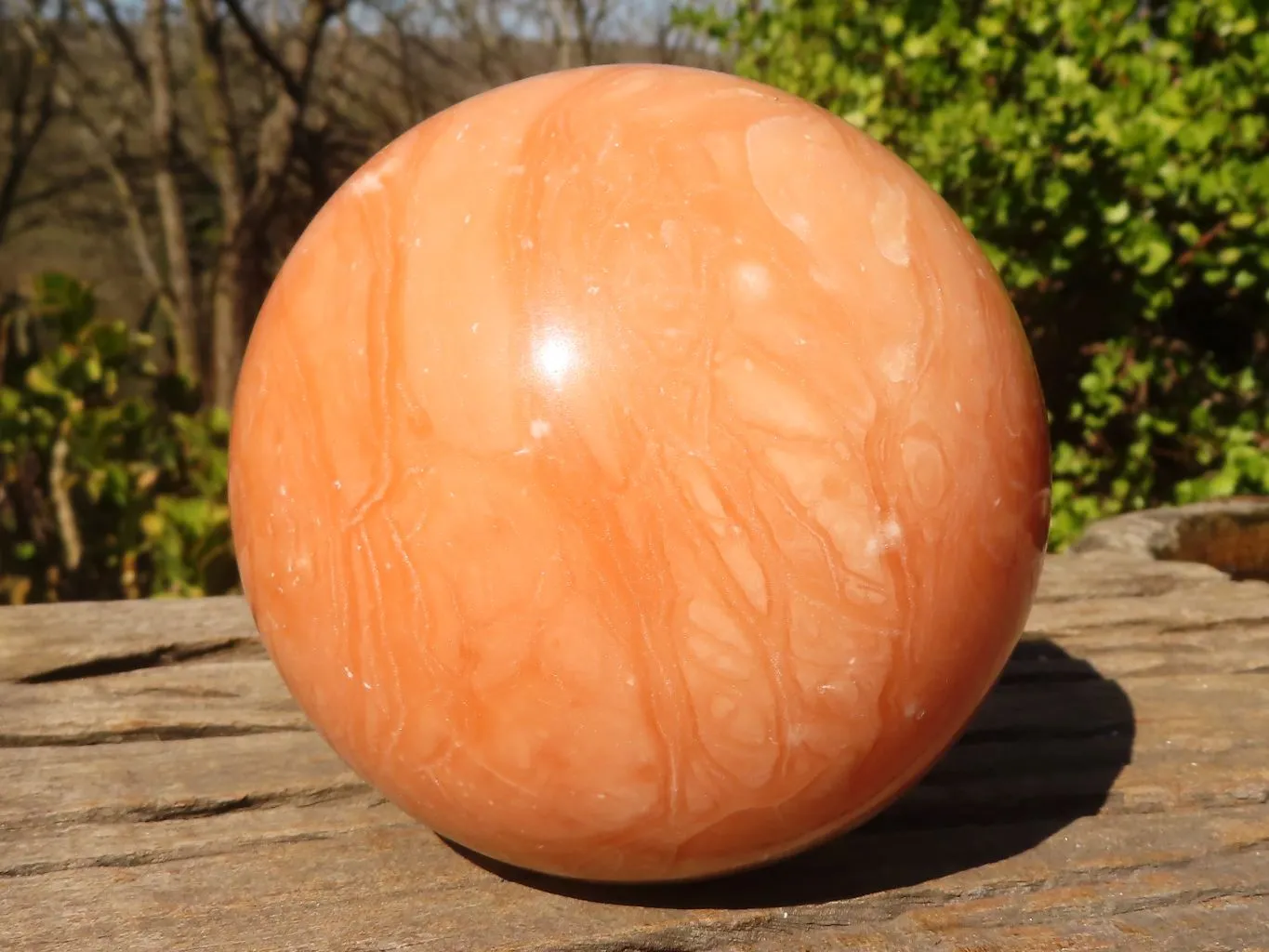 Polished Large Orange Twist Calcite Sphere  x 1 From Maevantanana, Madagascar