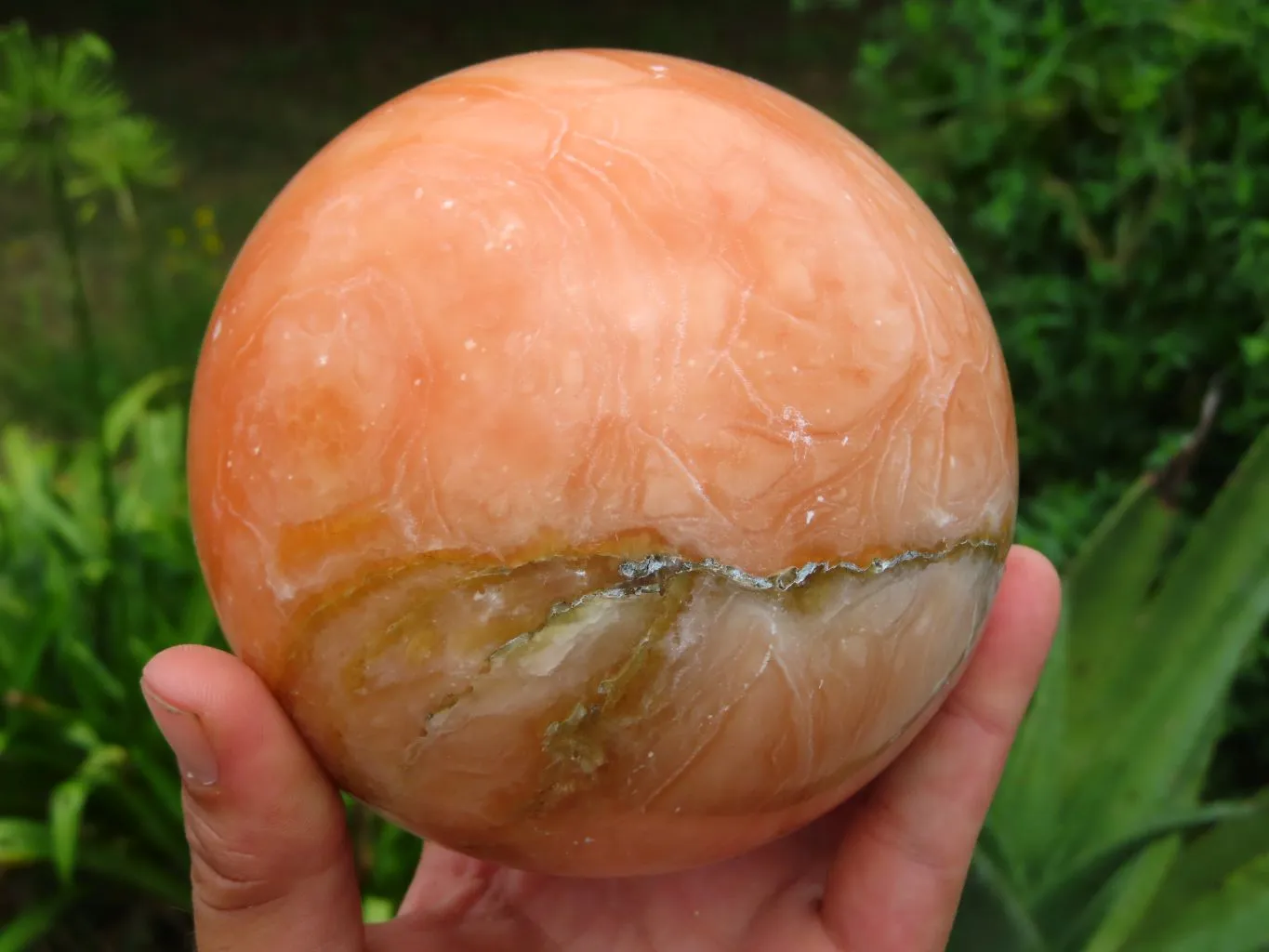 Polished Orange Calcite Sphere x 1 From Maevantanana, Madagascar